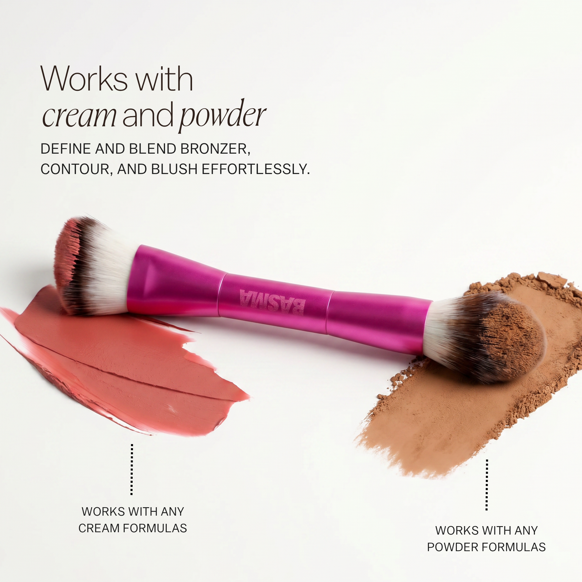 Makeup brush with pink handle and brown bristles on a white background with makeup products.