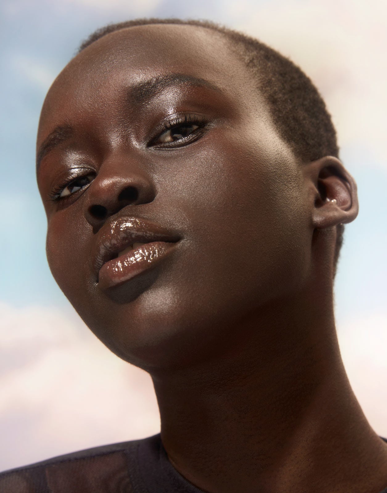 Model wearing shade 001 with a full fave of make up. For deep skin with neutral undertones